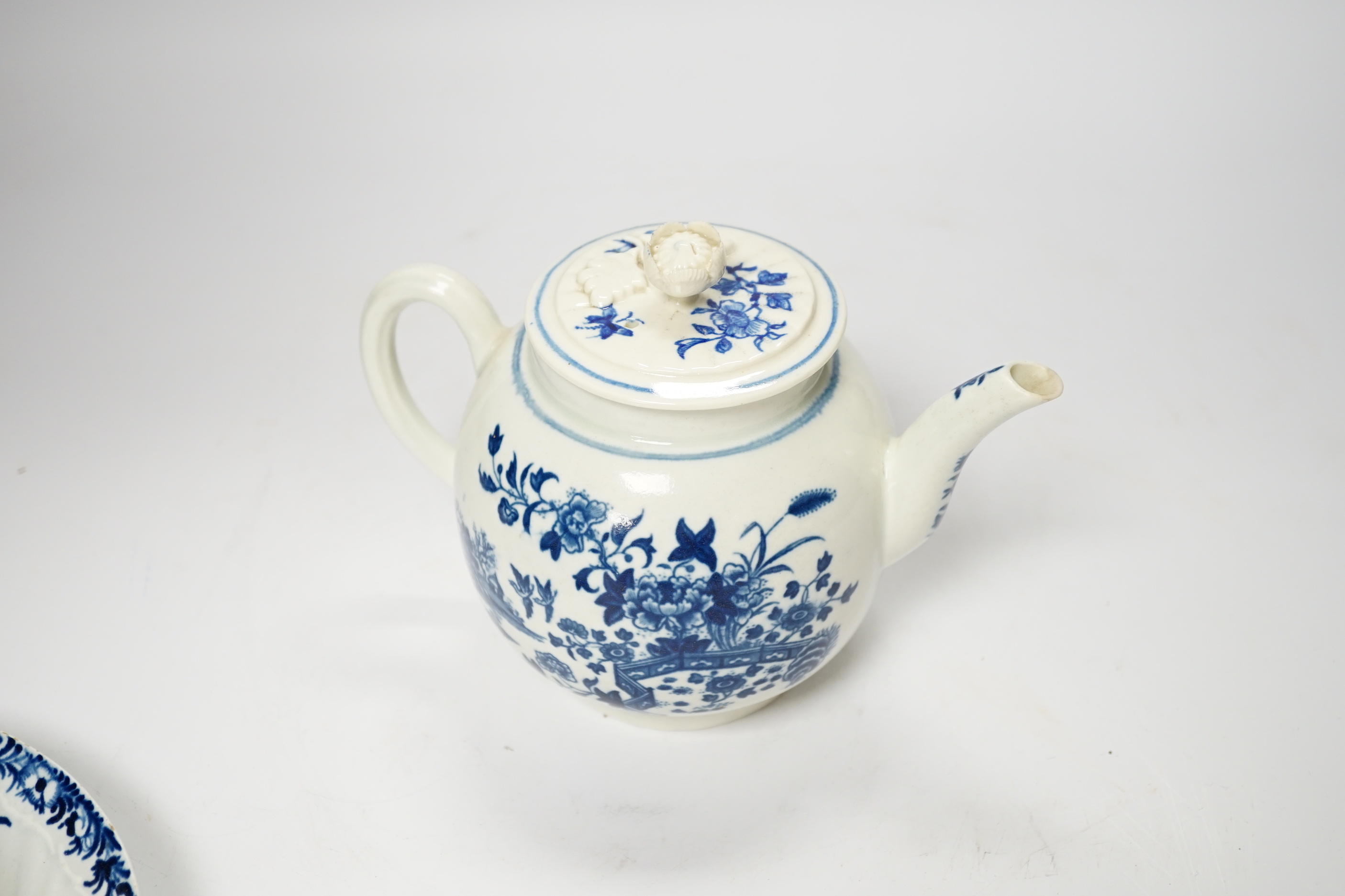 A Worcester “fence pattern” teapot, a similar bowl and dish, teapot 14cm high including cover